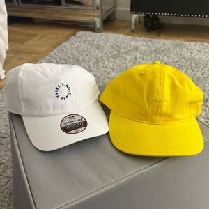 Supergoop! White and Yellow Baseball Caps
